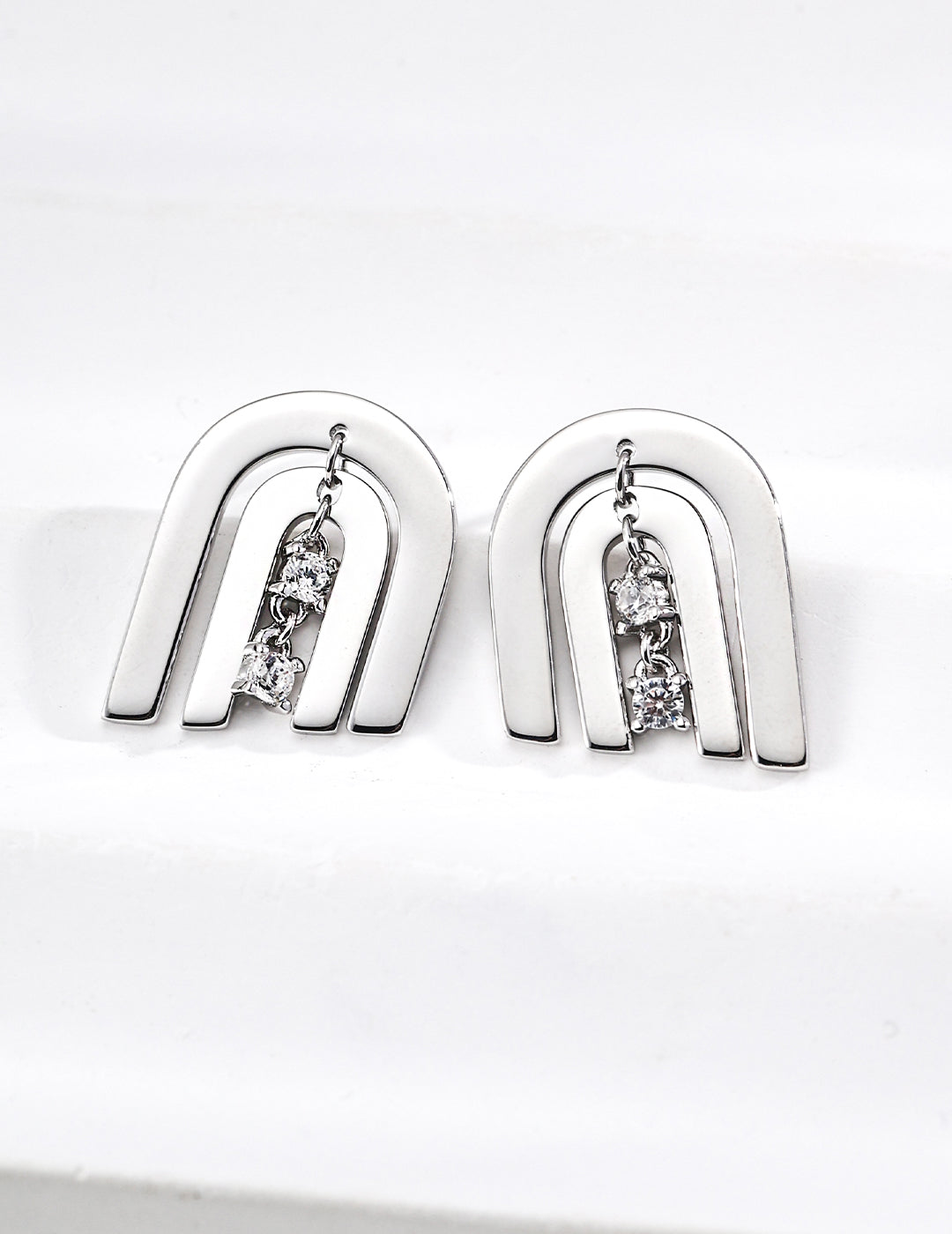 zircon earrings - white gold image