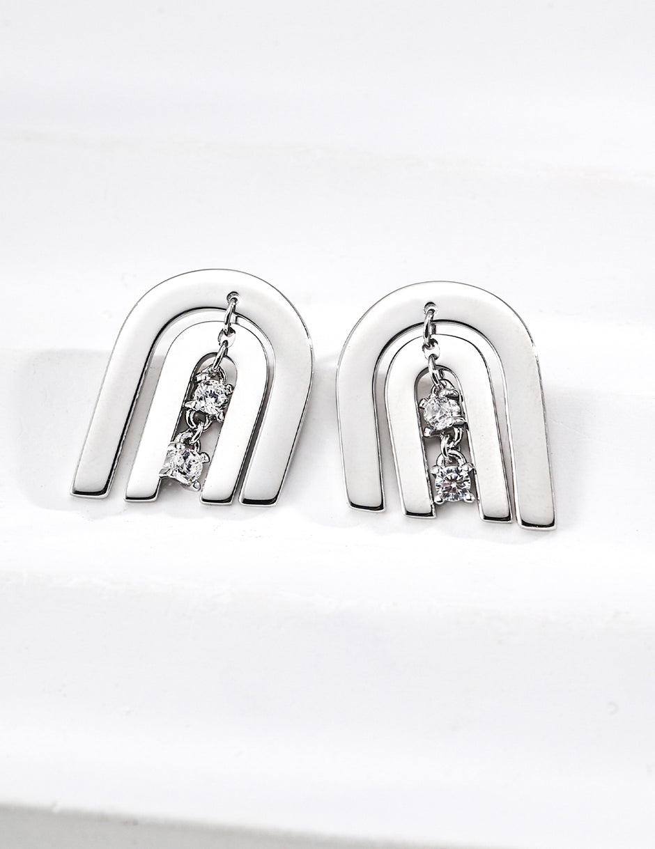 zircon earrings - white gold image